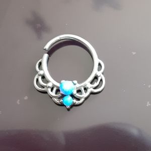 Never worn septum ring w/ blue gem